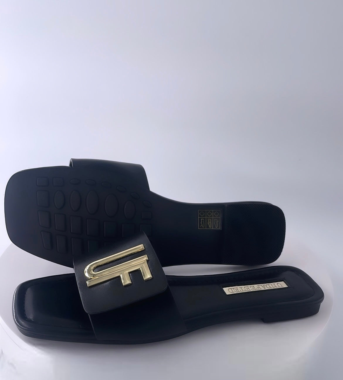 Leather signature “UF” sandals