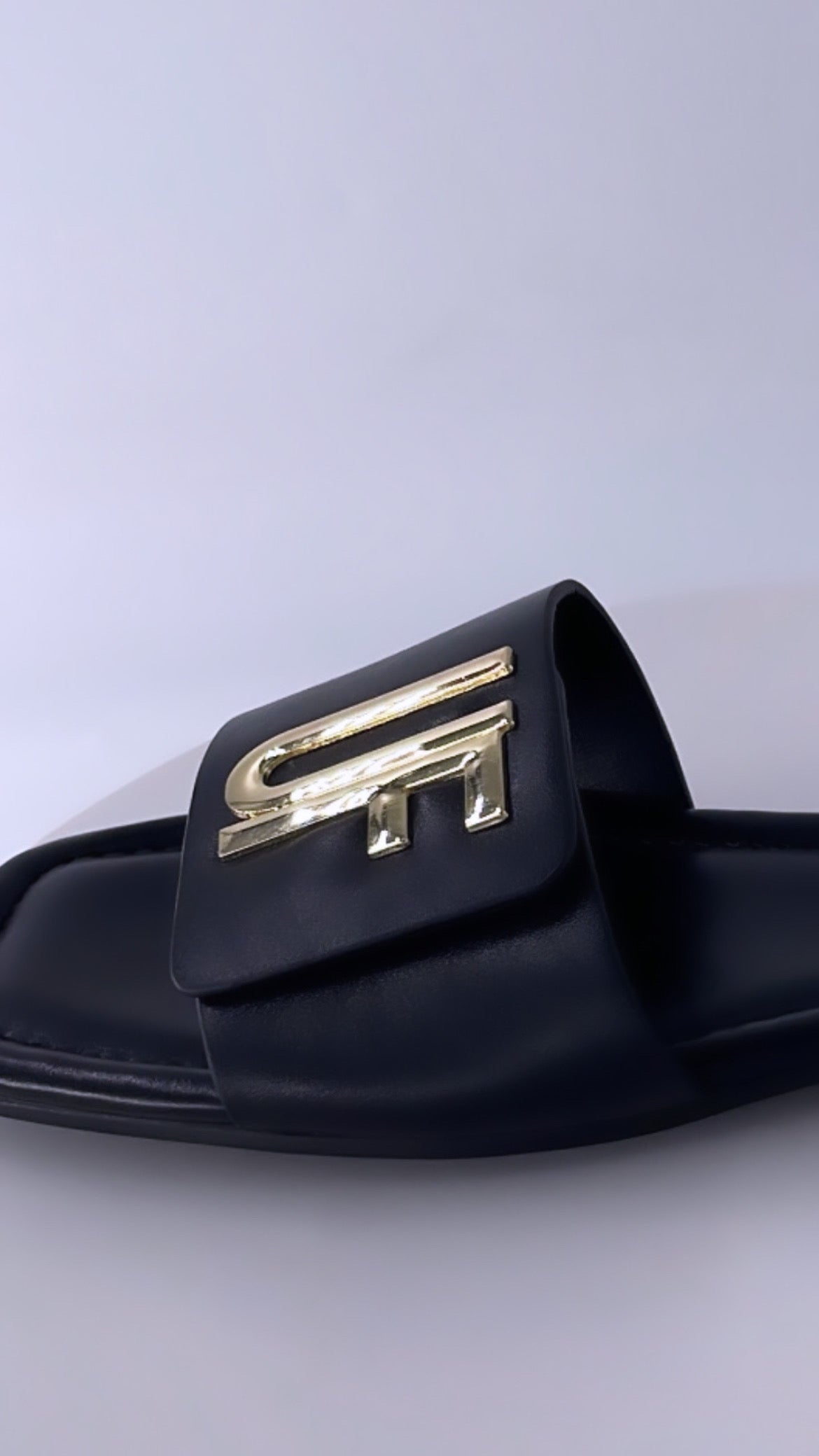 Leather signature “UF” sandals